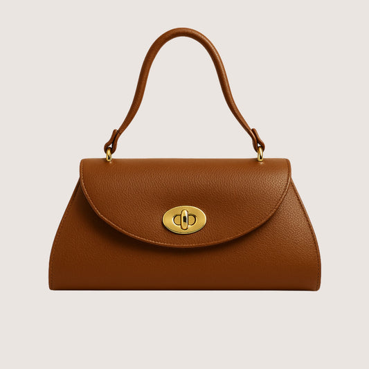 Florence top-handle bag in Cuoio Soft Togo leather, a warm caramel-toned hue, with gold turn-lock closure, front view.